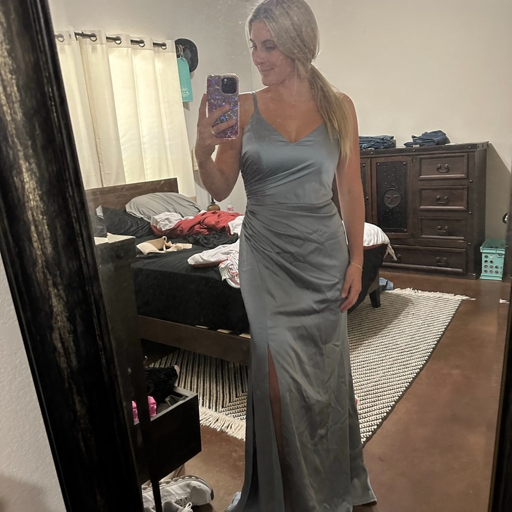 Blue bridesmaid dress. Worn once to wedding. Has been dry cleaned.